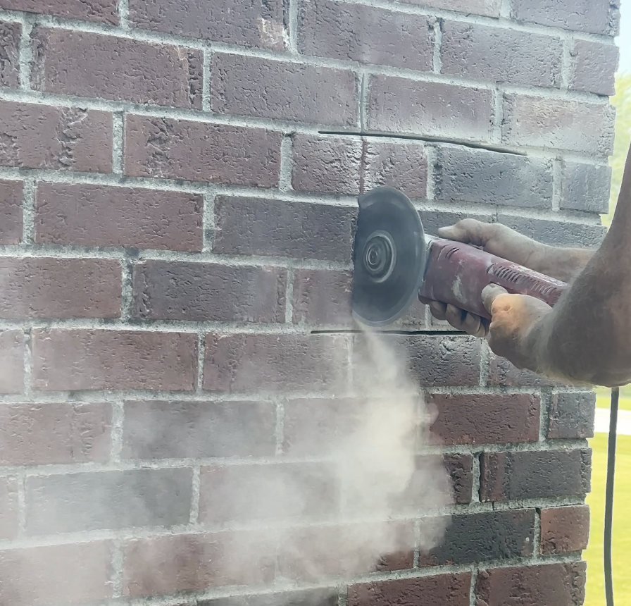 Cutting bricks with masonry blade for Honeybee Removal