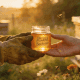 Golden honey jar exchange at sunset, showcasing the mindful beekeeper's dedication.